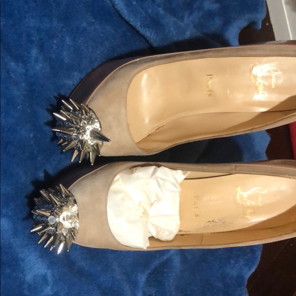 christian louboutin nude high heels with spikes